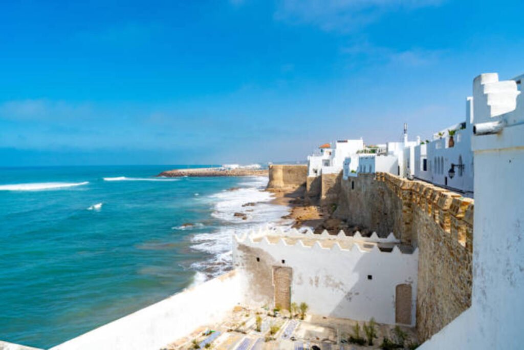 the fortified walll and coastline view of medina, asilah, morocco.